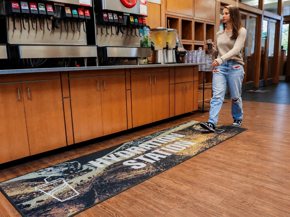 Custom interior logo mat inside a hospitality space