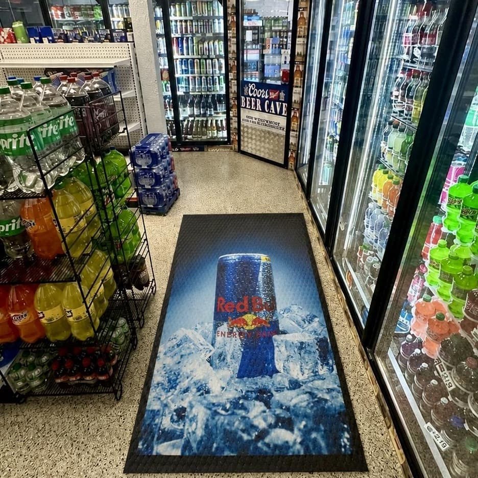 Floor Impressions Rubber Mat installed in a beverage retail aisle