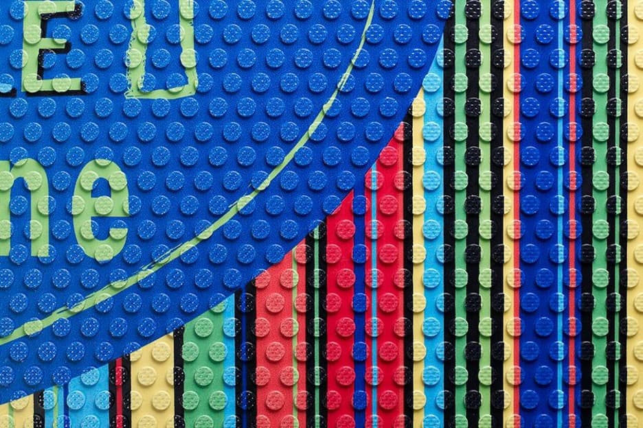 Close-up of Outdoor Scraper Logo Mat raised cleat surface