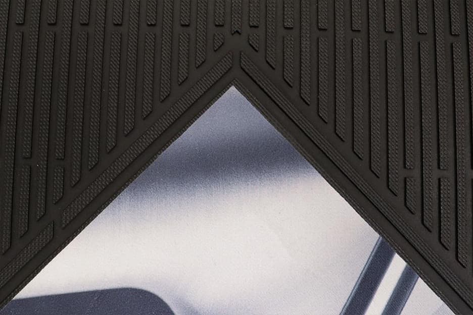 Close-up of POP Scrape Promo Mat cleated border texture