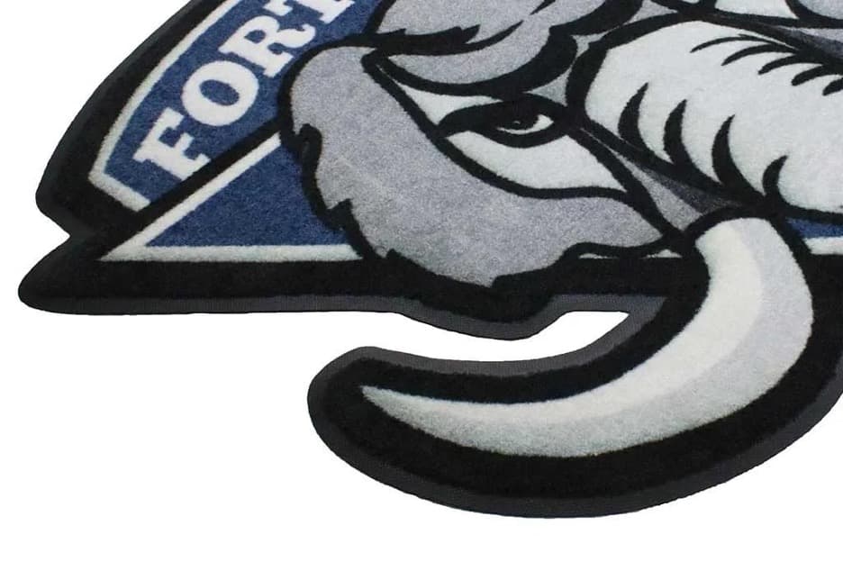 Close-up of Signature HD Custom Shape Logo Mat custom-cut edge