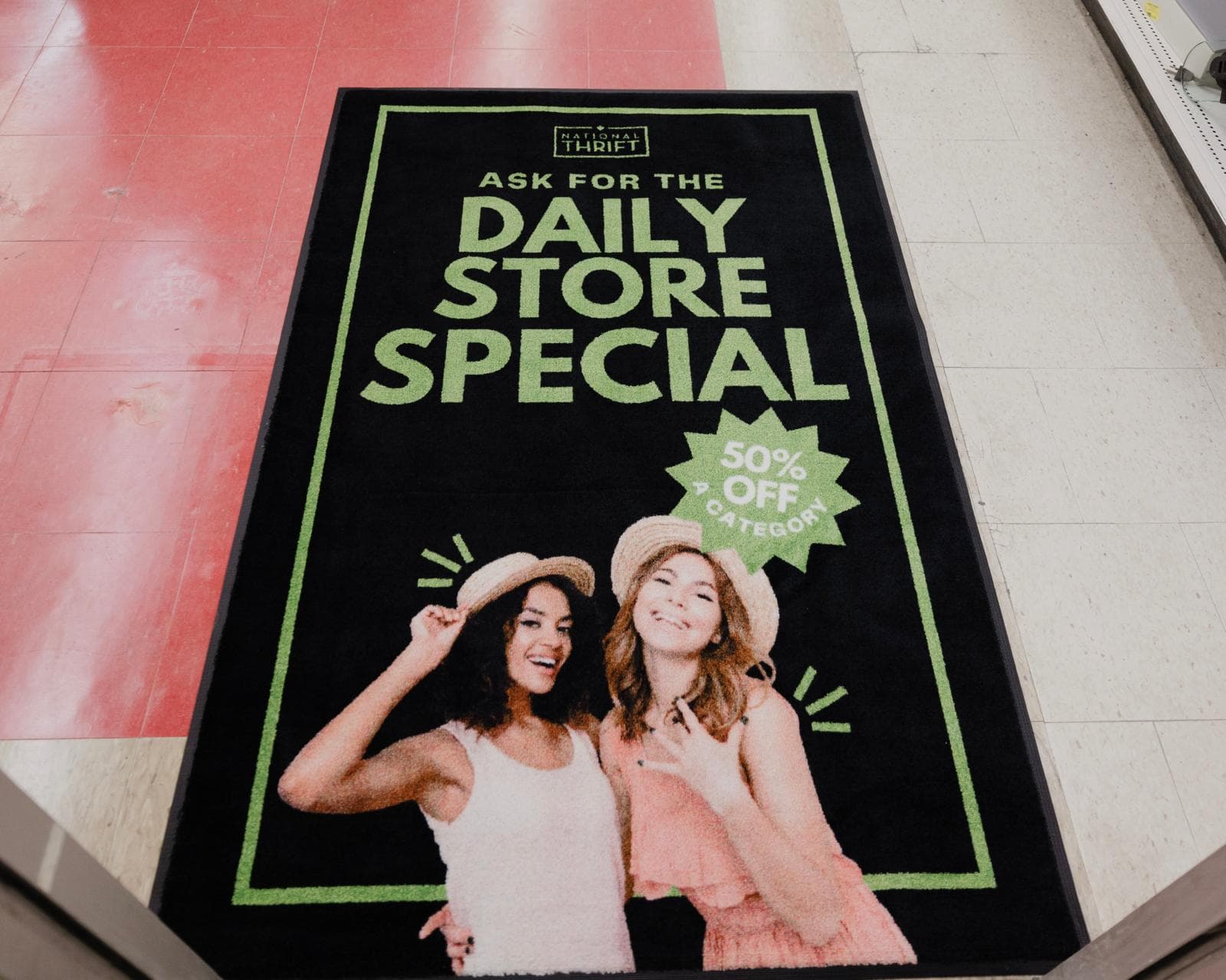 National Thrift custom promotional floor mat in a retail store