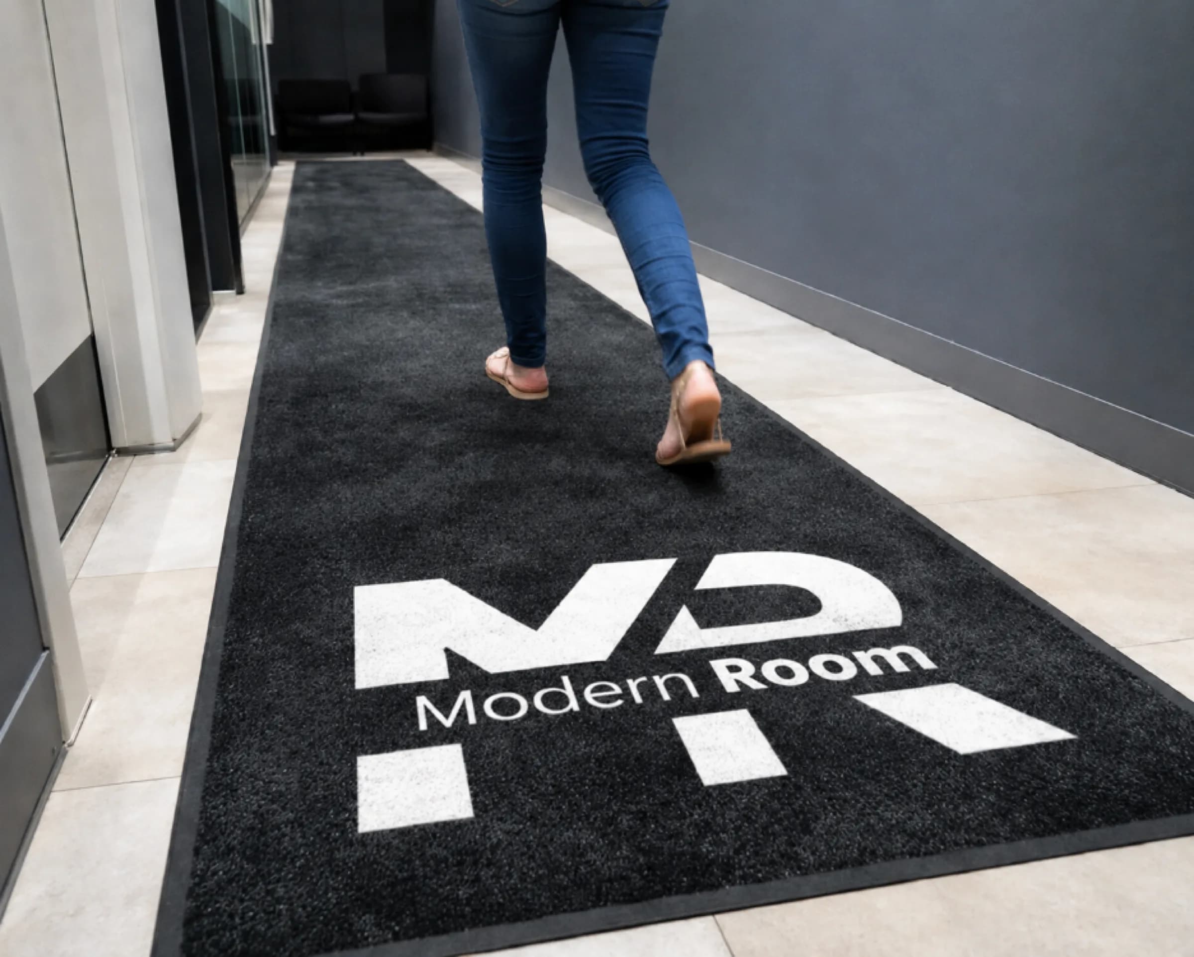 Classic custom logo runner installed in a modern office