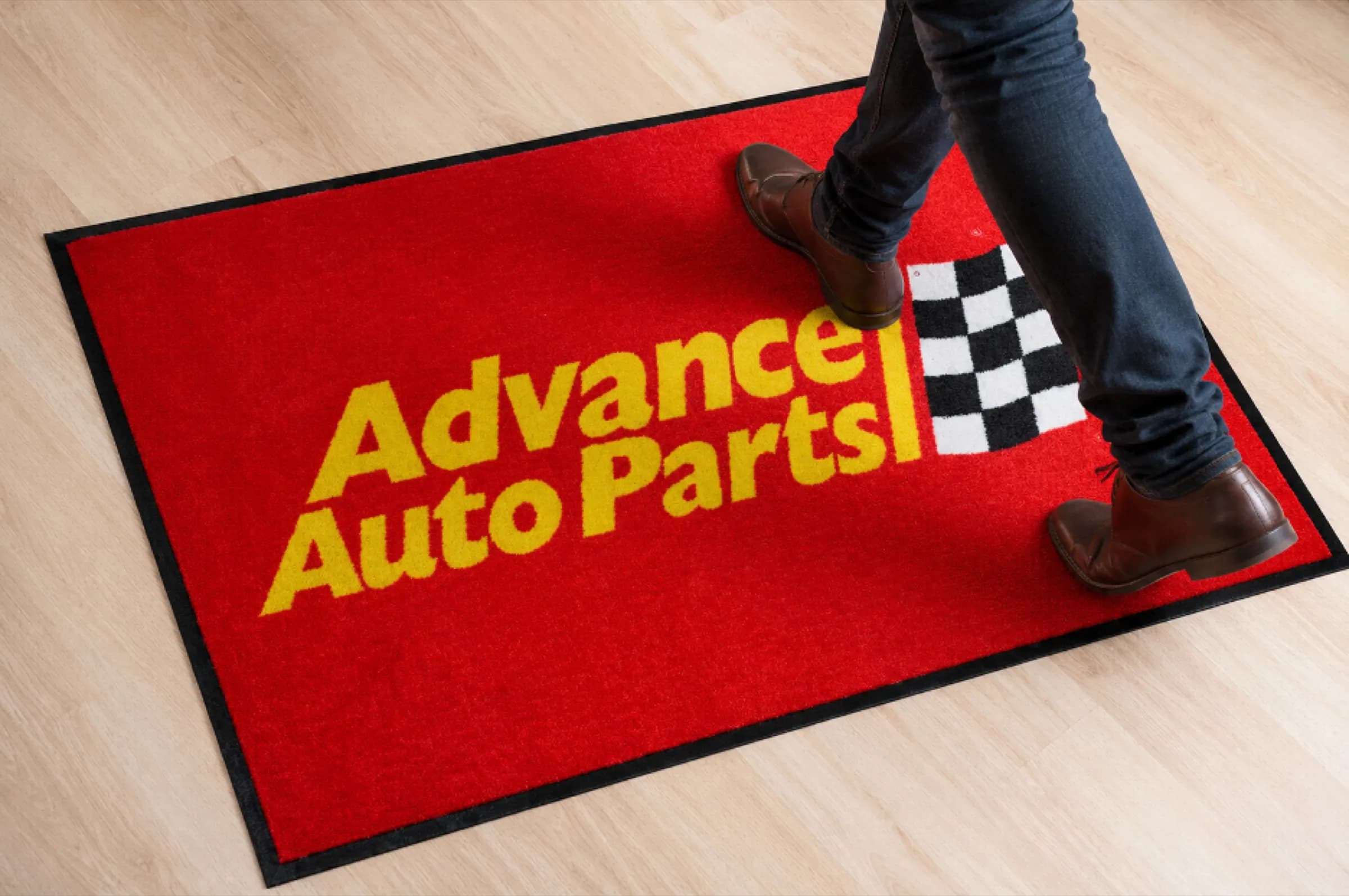 Essential Indoor Logo Mat placed at a front entrance